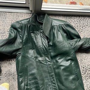 Woman’s full length forest green leather coat